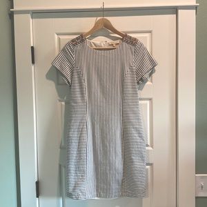 Blue and white striped dress with embroidered shoulder detail